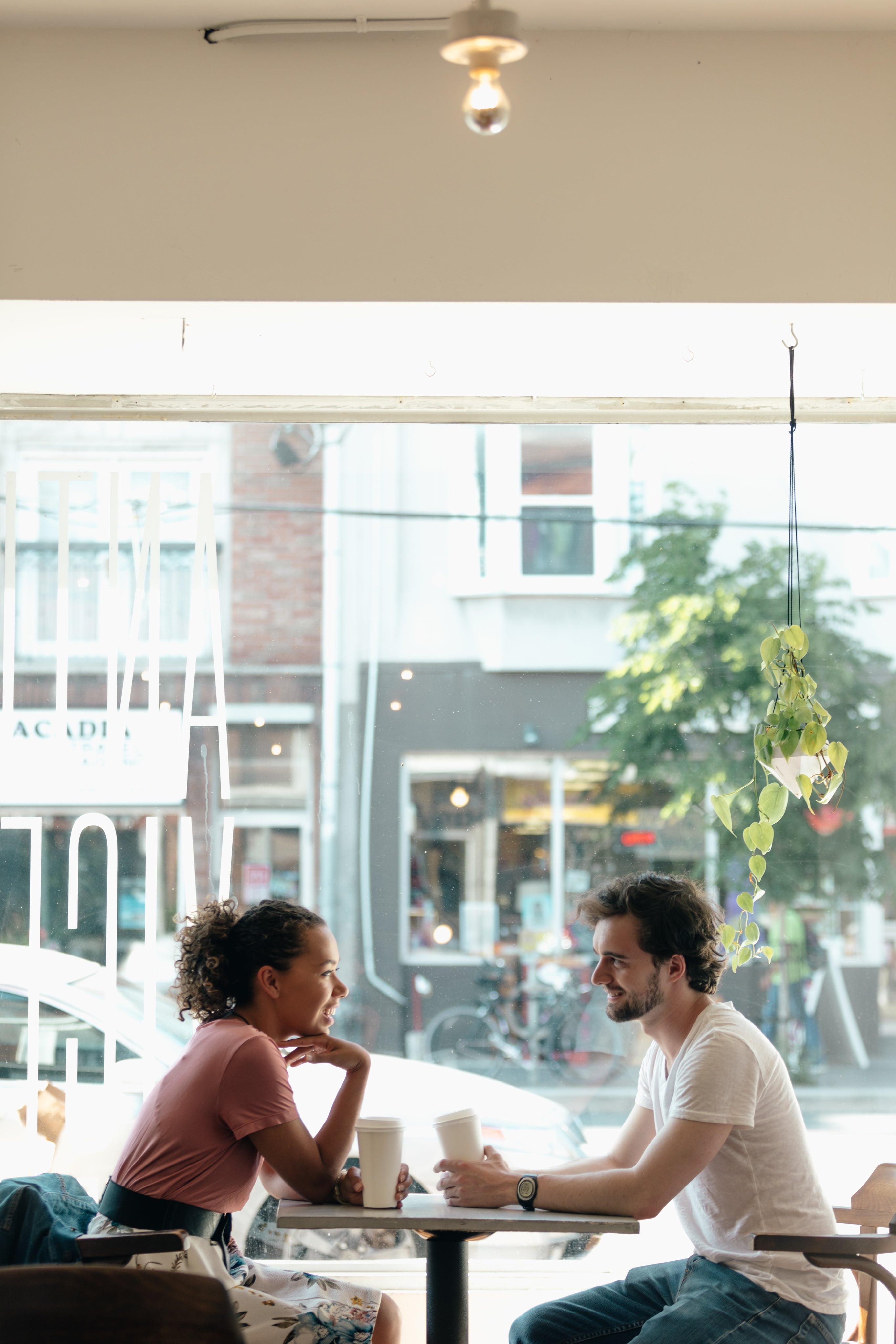 files/a-man-and-a-woman-are-framed-against-a-sunny-window.jpg