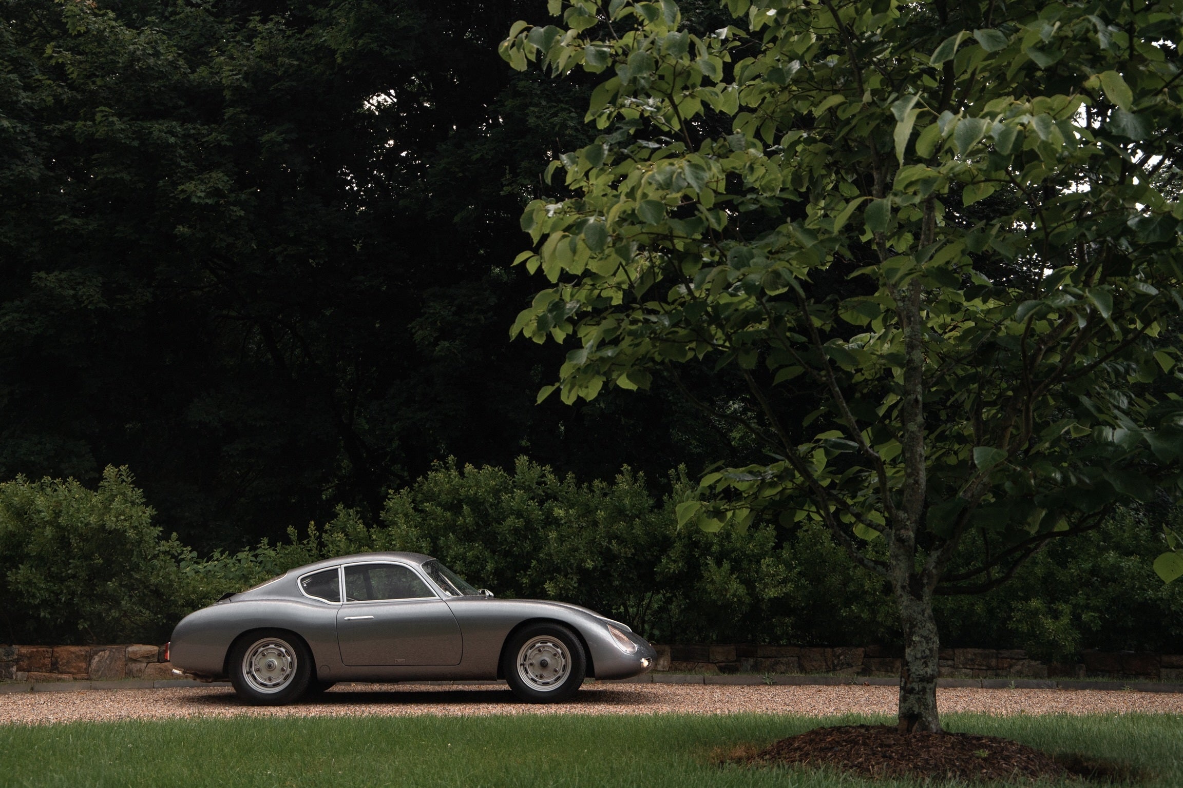 files/silver-car-parked-on-a-green-country-road.jpg